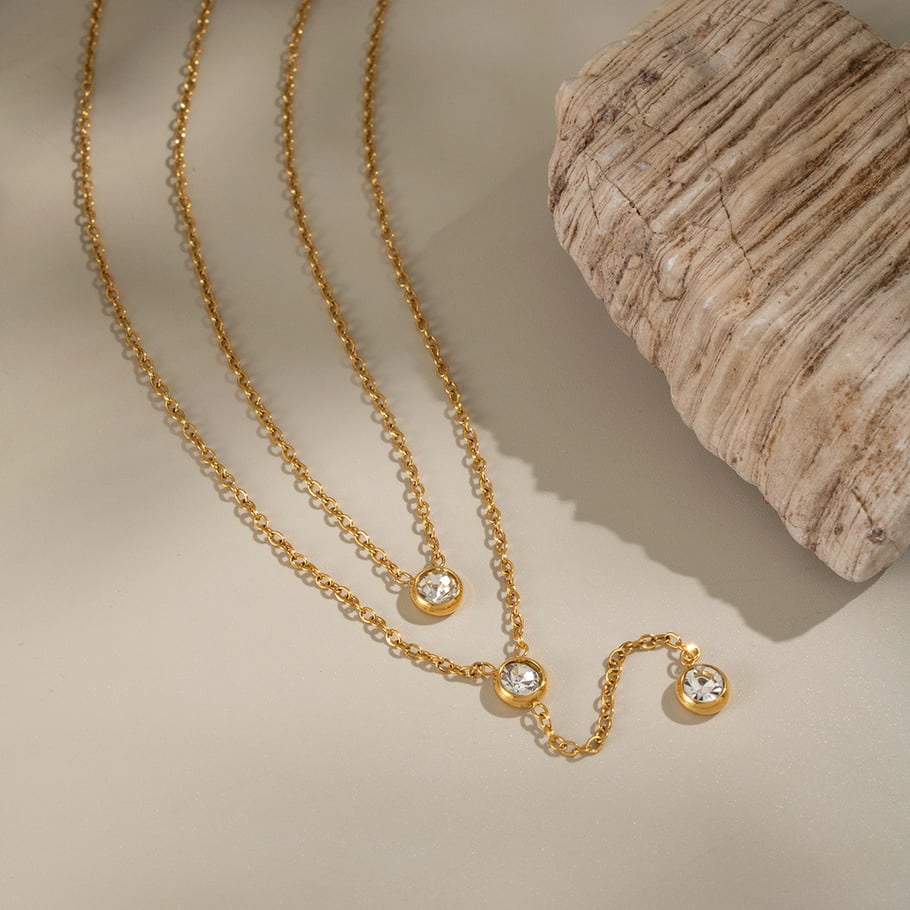 1 collar lujoso con borlas circulares de acero inoxidable y circonitas de color dorado para mujer. Imagen4