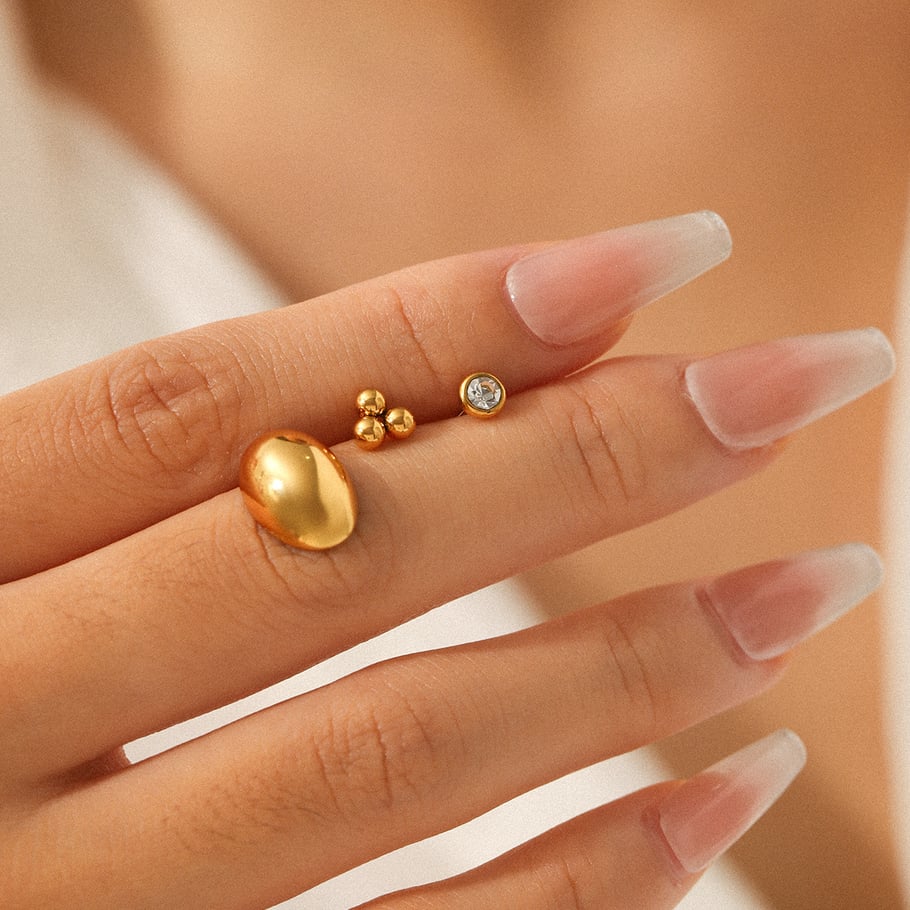 1 set di orecchini a bottone da donna in acciaio inossidabile color oro con forma irregolare Immagine4
