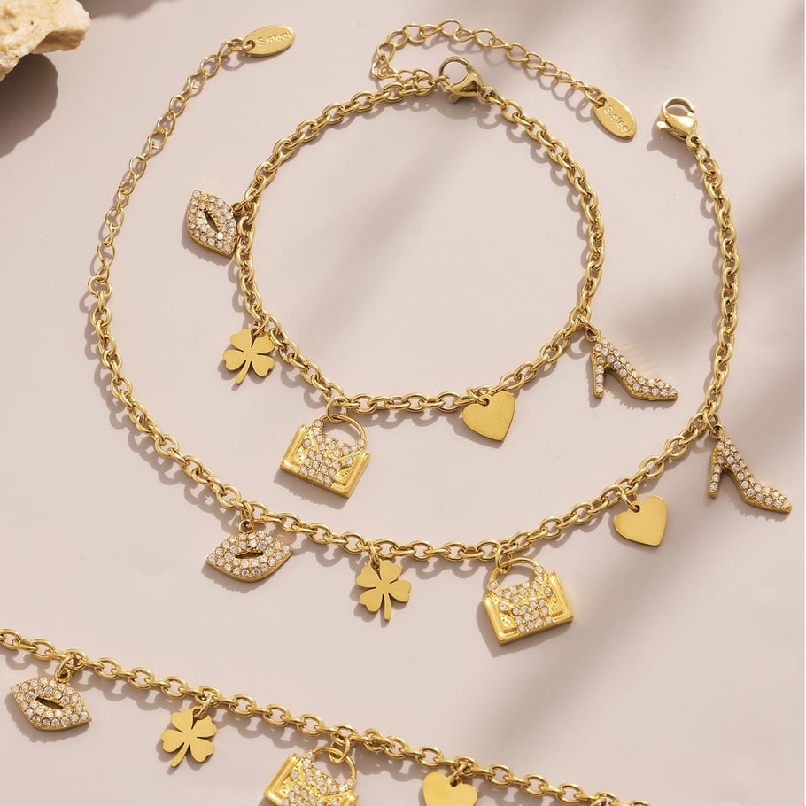 Conjuntos de joyas de acero inoxidable con forma de corazón y trébol de color dorado para mujer. Imagen2