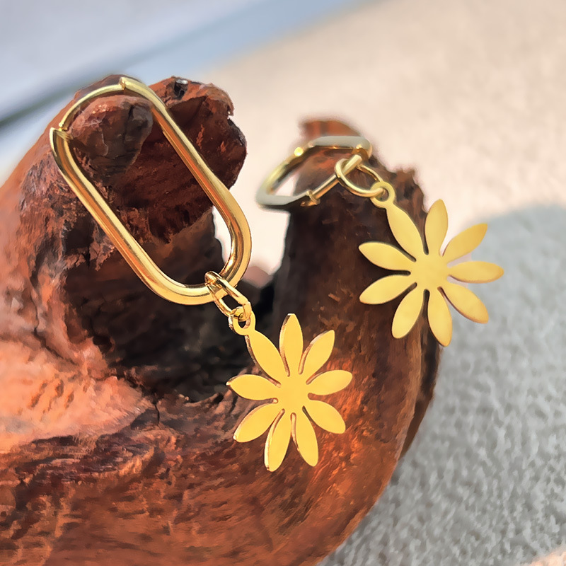 1 paar roestvrijstalen oorbellen met bloemen en gouden hangers Afbeelding2