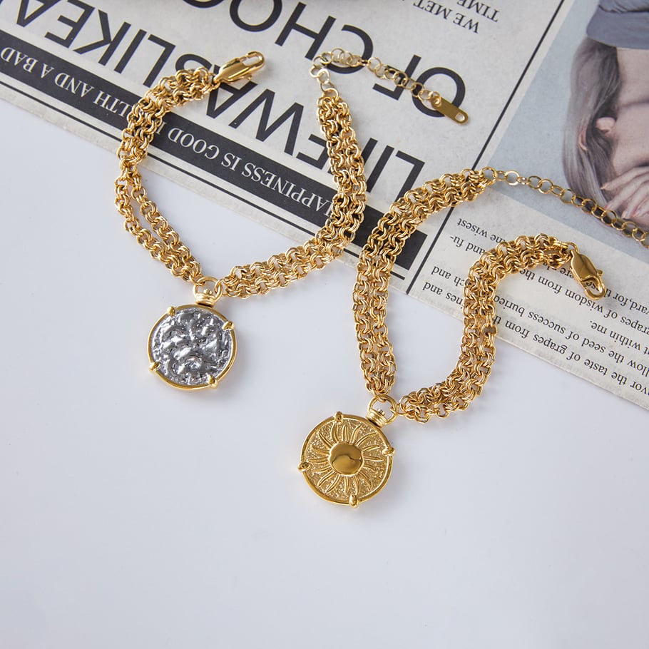 Set di gioielli da donna in acciaio inossidabile color oro con sole classico a due lati Immagine4