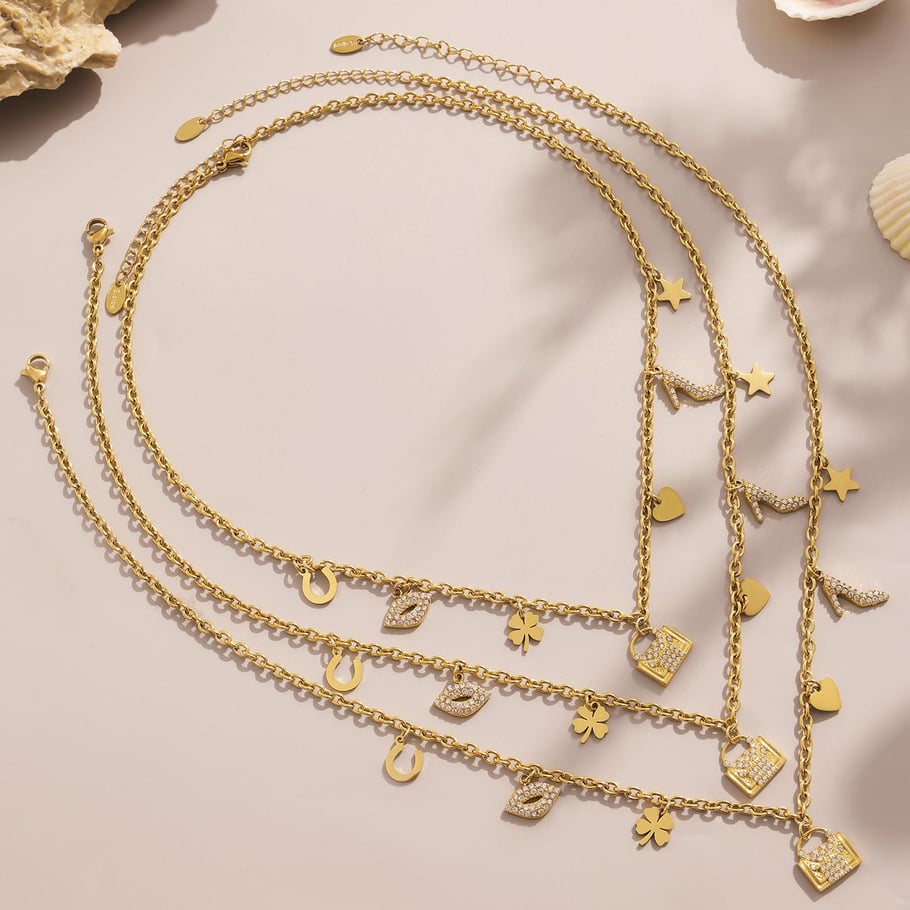 Conjuntos de joyas de acero inoxidable con forma de corazón y trébol de color dorado para mujer. Imagen6