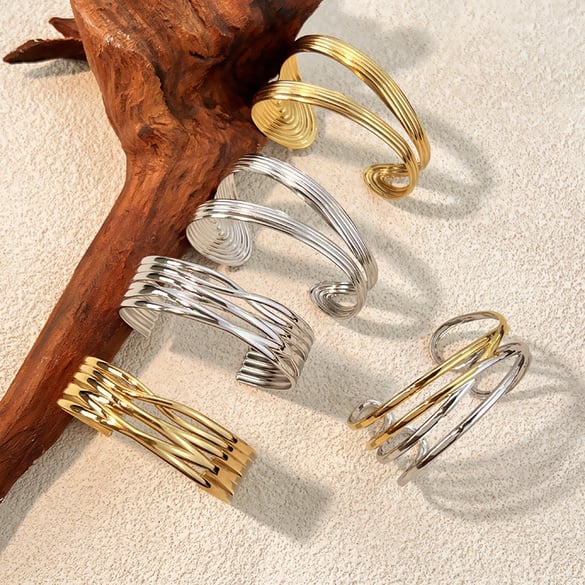 1 Stück unregelmäßig geformtes Manschettenarmband aus Edelstahl in Goldfarbe 2