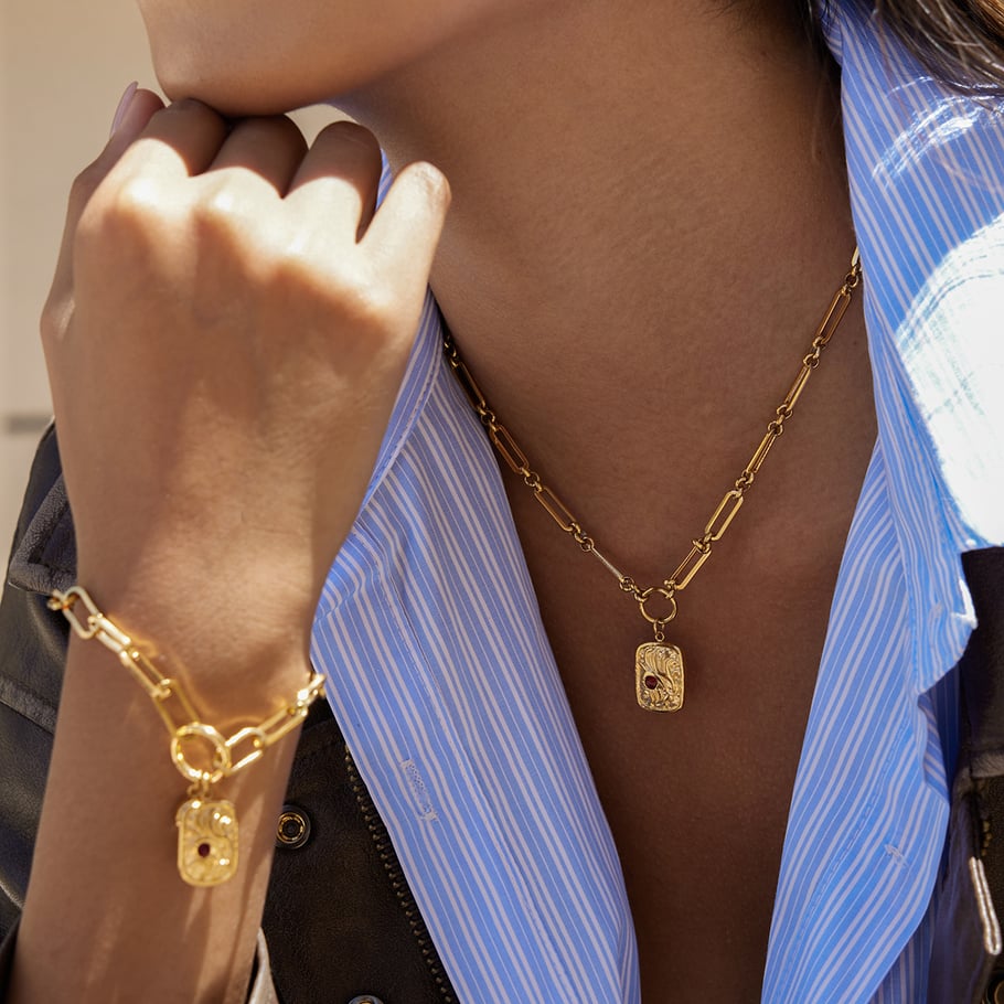 Set di gioielli da donna sofisticati in acciaio inossidabile con zirconi color oro e forma rettangolare Immagine6
