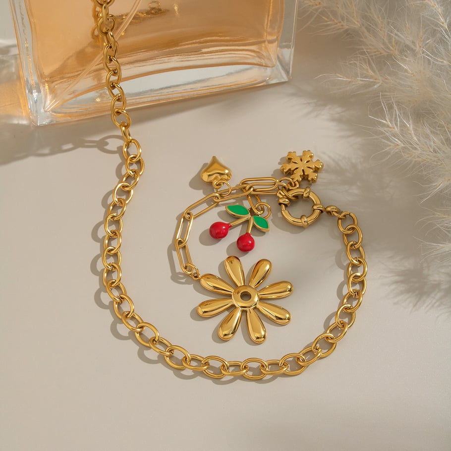 Set di collane in acciaio inossidabile color oro con fiore romantico e ciliegia Immagine4