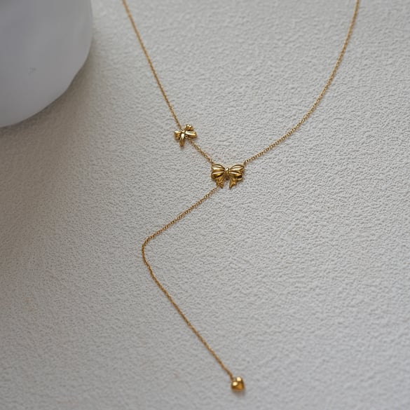 1 Stück Halsketten mit Anhänger aus Edelstahl mit Schleife und Knoten in Goldfarbe für Damen