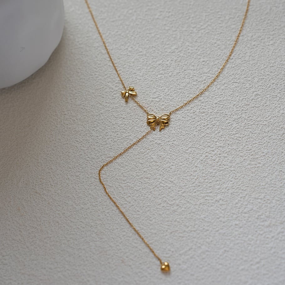 1 Stück Halsketten mit Anhänger aus Edelstahl mit Schleife und Knoten in Goldfarbe für Damen Bild2
