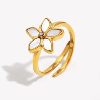 Anillo abierto de oro con flor de concha blanca 
