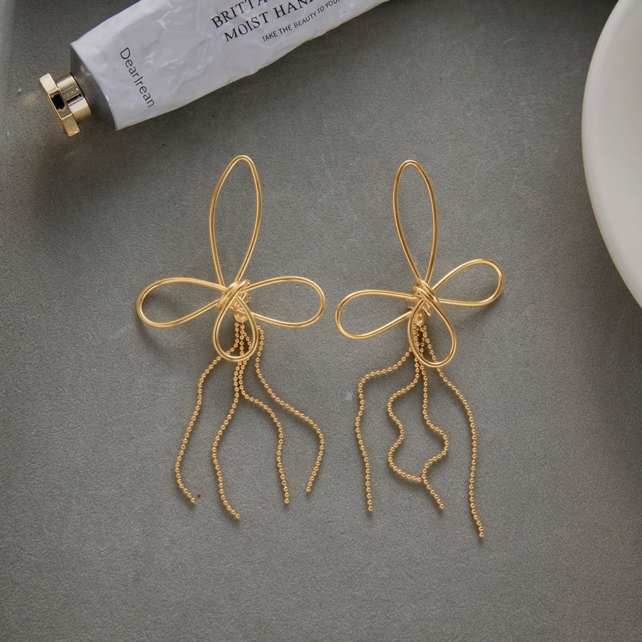 1 Paar wunderschöne baumelnde Ohrringe mit Schleife und Knoten, Edelstahl, goldfarben Bild5