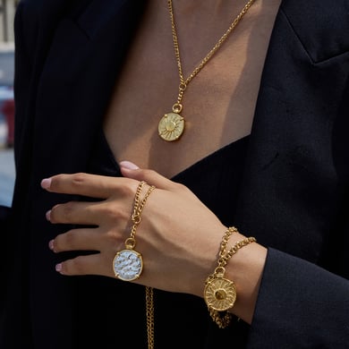Set di gioielli da donna in acciaio inossidabile color oro con sole classico a due lati h5 Immagine3