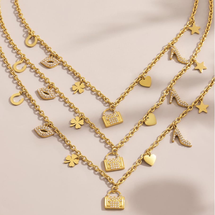 Conjuntos de joyas de acero inoxidable con forma de corazón y trébol de color dorado para mujer. Imagen5