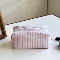 Sac coussin plissé à rayures verticales rose 