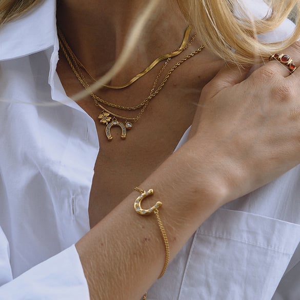 Luxuriöse hufeisenförmige Damenschmucksets aus Edelstahl mit goldfarbenem Zirkon 2