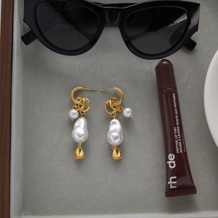1 paio di splendidi orecchini pendenti da donna in acciaio inossidabile color oro con forma irregolare a goccia Immagine6