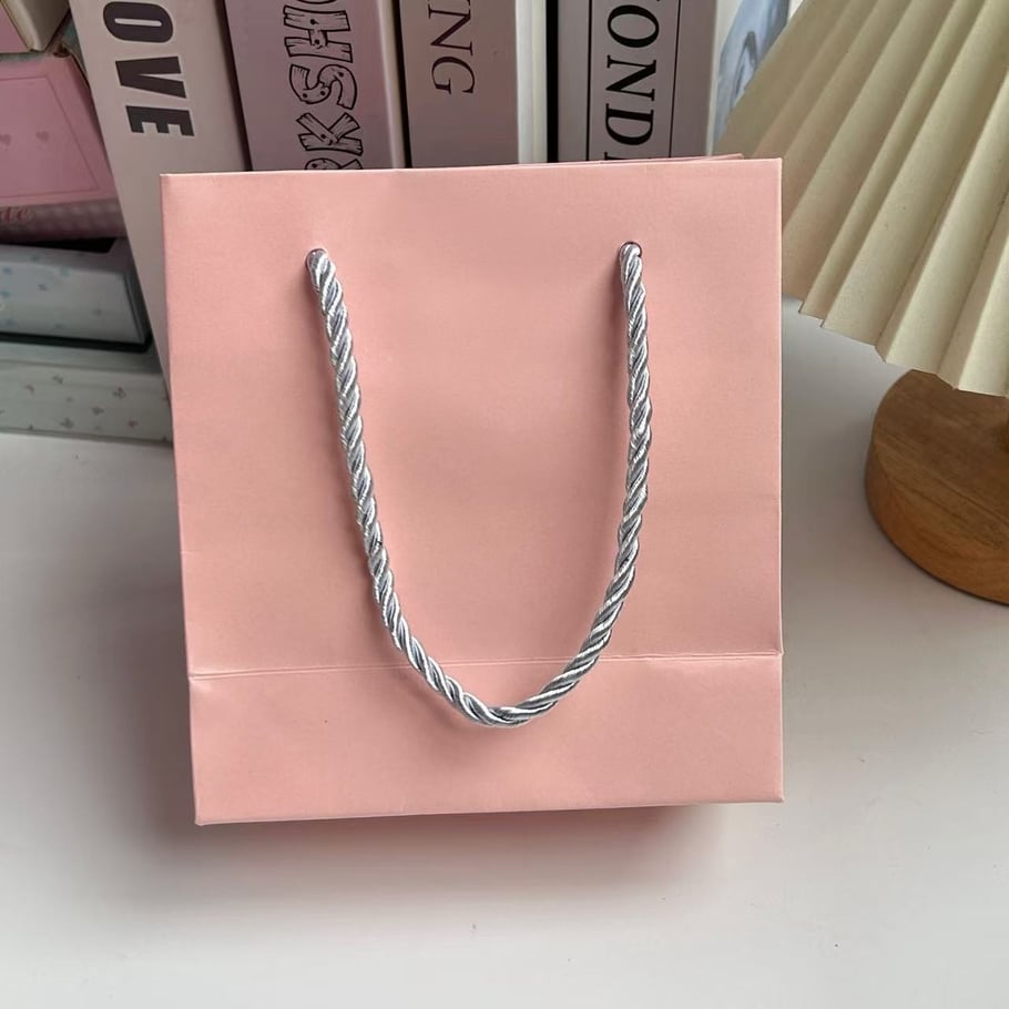 1 sac de courses en papier de couleur unie