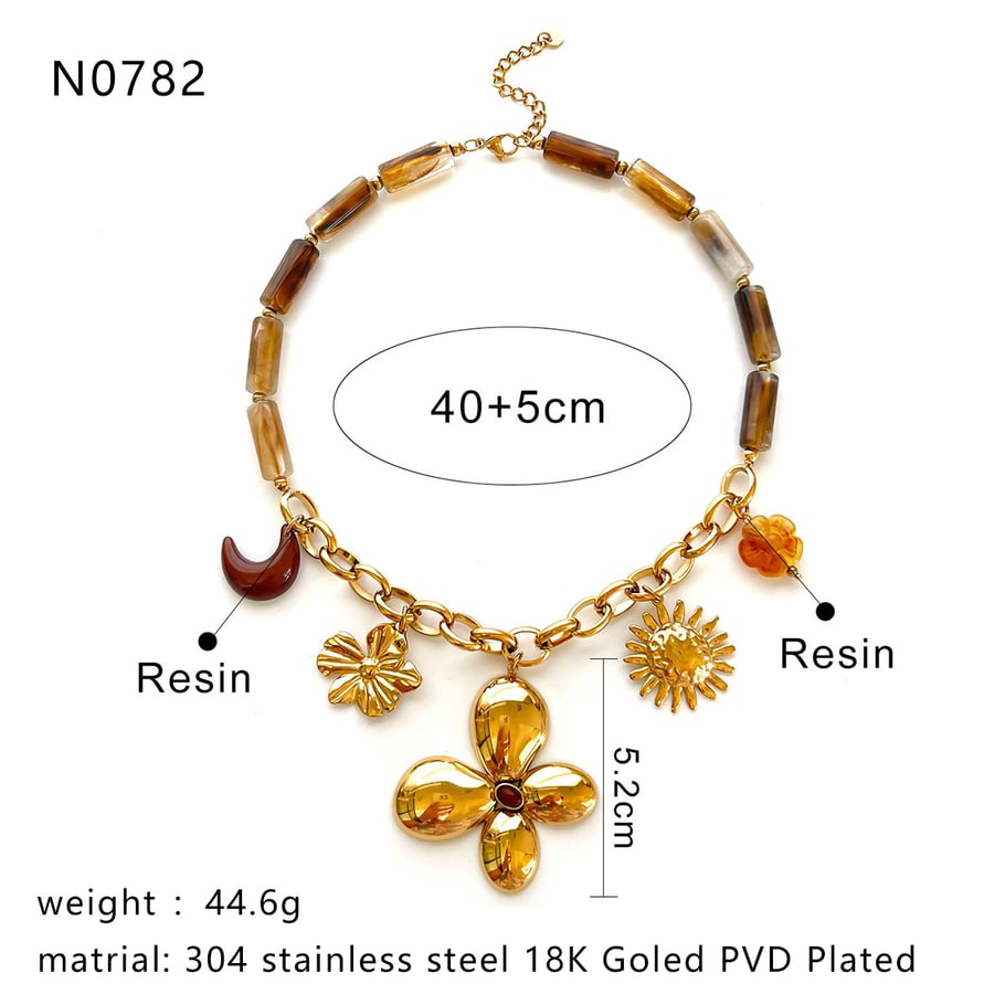 1 collar con colgante de resina con forma de flor, sol y luna. Imagen2