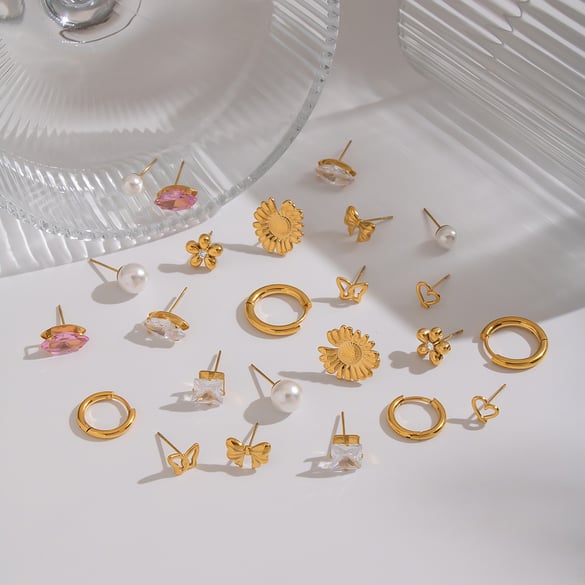 1 set di orecchini in acciaio inossidabile color oro con zirconi