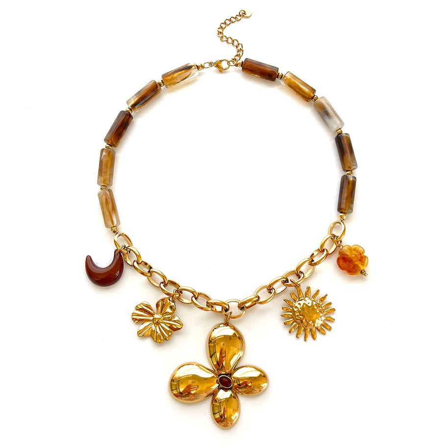1 collar con colgante de resina con forma de flor, sol y luna. 