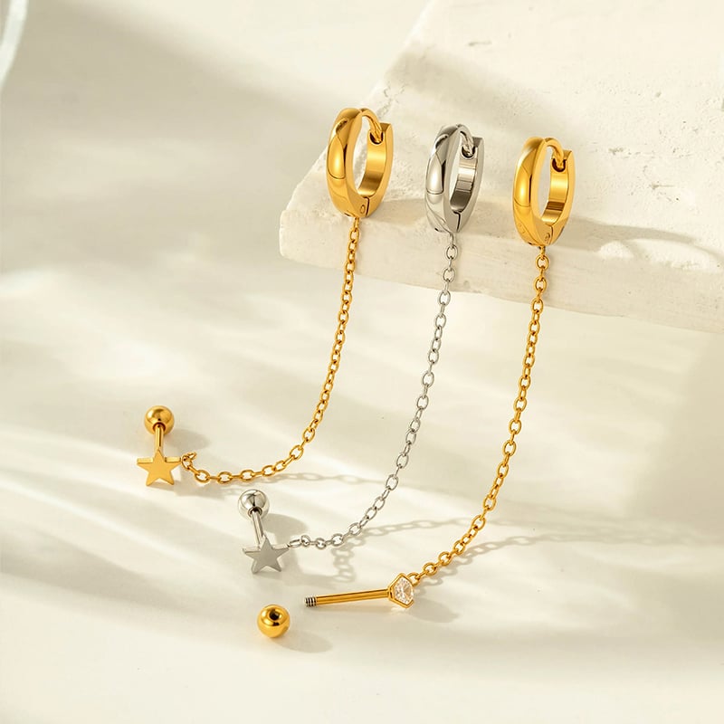 1 orecchino piercing semplice a forma di cerchio con stella color oro e zirconi Immagine3