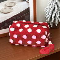 Borsa a cuscino rossa a pois in lana da tenere in mano 