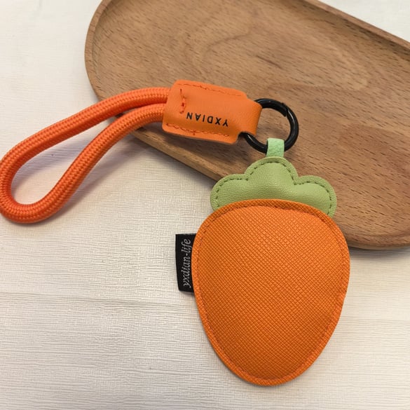 1 pezzo di grazioso ciondolo per borsa in pelle vegetale