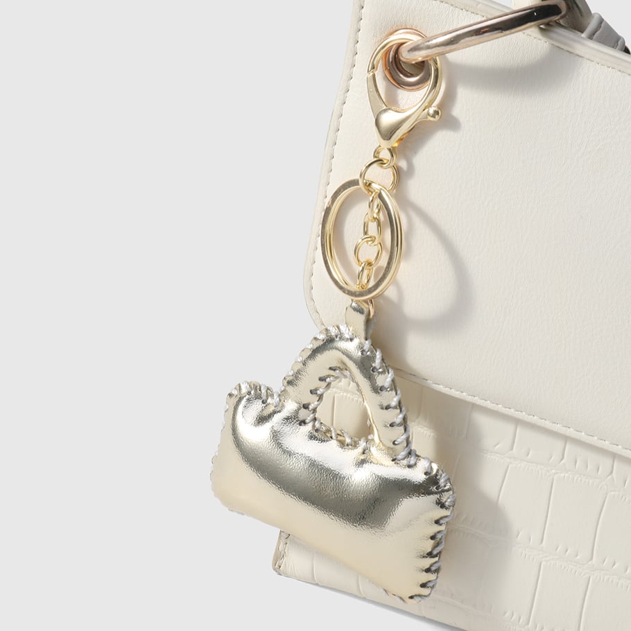 1 pieza de delicados adornos para bolsos de mujer de cuero de color metálico Imagen5