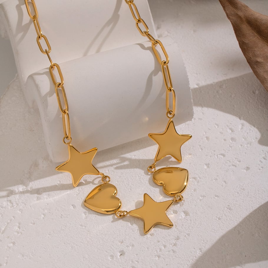 1 collar con colgante de corazón y estrella de acero inoxidable en color dorado. h5Imagen3