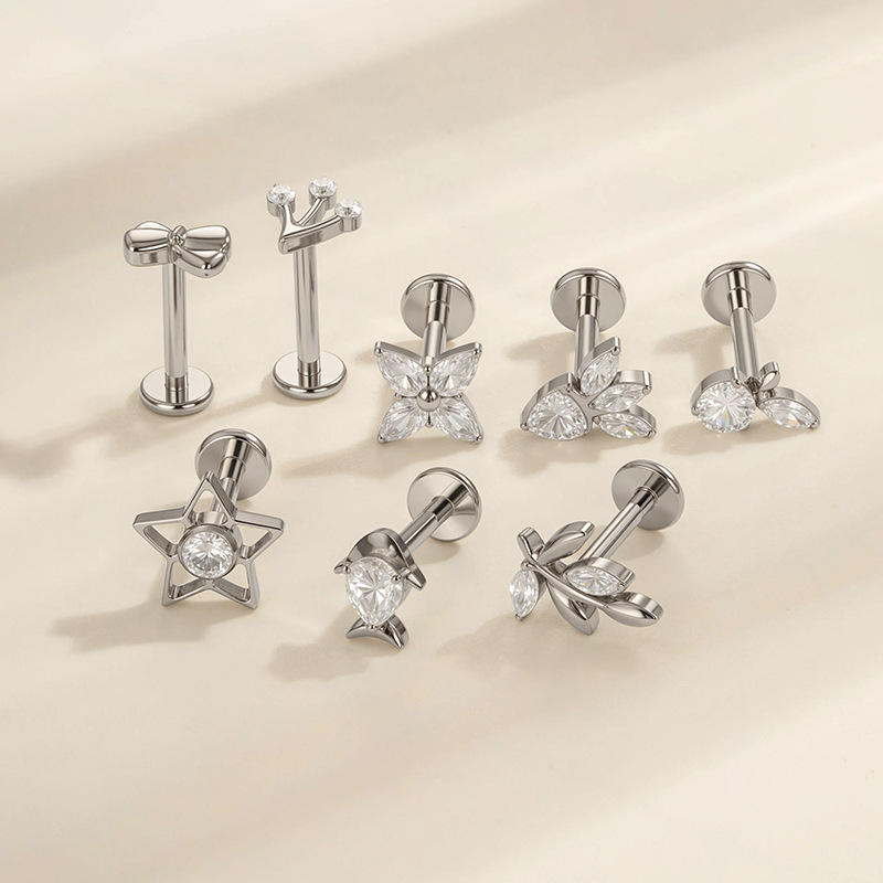 1 stuk glanzende strikknoop stervis titaniumlegering goudkleurige zirkoon piercing oorbellen voor dames h5Afbeelding4
