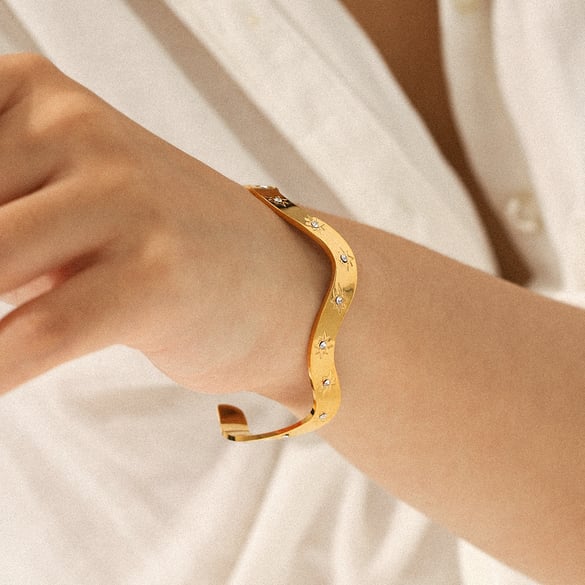 Pulsera de acero inoxidable con circonitas de color dorado y forma irregular de estrella de 1 pieza 2