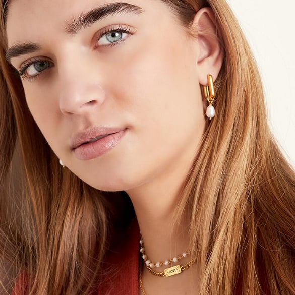 Collana con perline a forma di proiettile