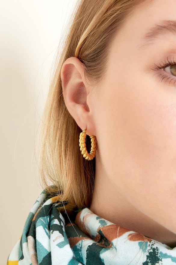 Boucles d'oreilles en acier inoxydable tournées Argenté